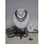 A quantity of contemporary silver and mixed bead jewellery, some on leather necklaces with silver