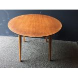 A mid-century satinwood occasional table, the circular top raised on four tapering legs 45 x 58cm (