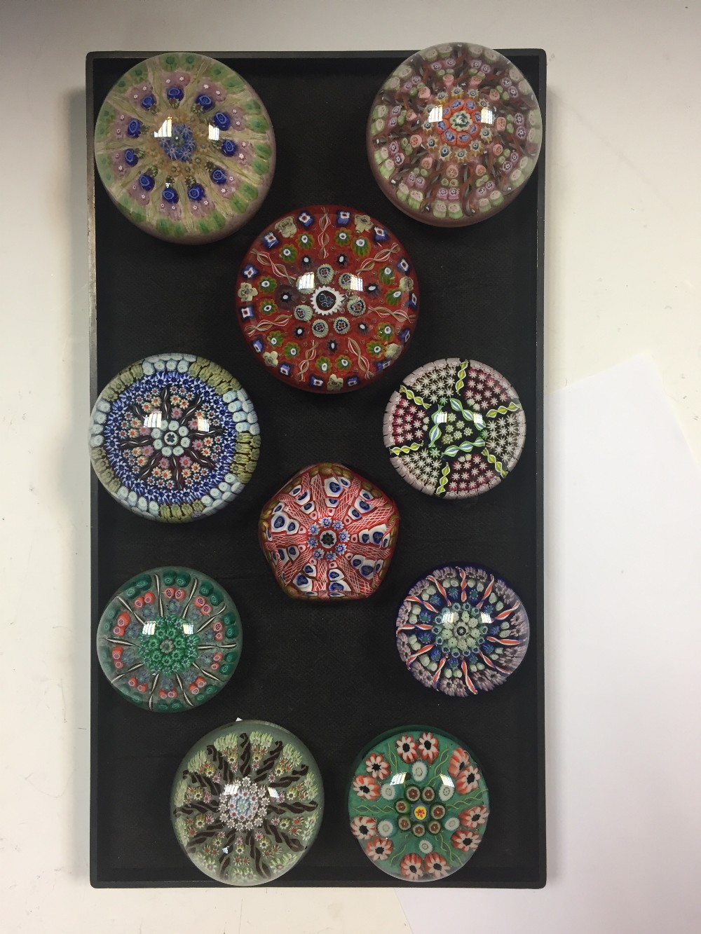 A collection of ten Perthshire and other Scottish spoke design paperweights, of varying colours,