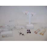Approximately 19 pairs of contemporary earrings of varying styles, most stamped 925, gross approx.
