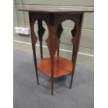 A Moorish style hexagonal mahogany occasional table in the manner of Liberty & Co., 67cm high