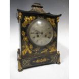 A 1920's Chinoiserie decorated 8 day mantel clock with pagoda top, 31 cm high