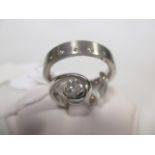 A single stone diamond and platinum ring, the round brilliant cut diamond, estimated approx. 0.