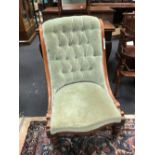 A Victorian mahogany framed drawing room chair