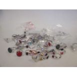 A quantity of contemporary silver designer rings, to include some gemset rings, most stamped 925,