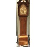 A George III oak longcase clock with arched brass 8-day movement, signed Valentine Downs, Louth,