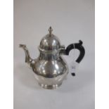 A Queen Anne style silver teapot by Elkington & co, Birmingham 1938, 20cm high, 20oz
