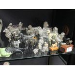 A collection of about 25 poodle figures