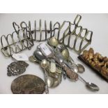 Miscellaneous silver souvenir tea spoons, silver belt buckle, tortoiseshell box lid etc