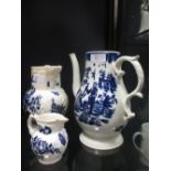 An 18th century English blue and white coffee pot, probably Liverpool, the baluster body decorated