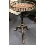 A George III style mahogany urn table, with galleried top, 67cm high
