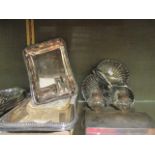 A silver cigarette box, crested, various small spoons, two pairs of silver plated entre dishes...