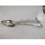 Three silver basting spoons and a marrow scoop