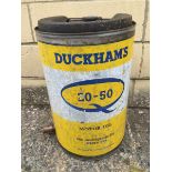 A Duckhams 20-50 Motor Oil five gallon drum.