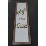 A Fry's Pure Cocoa rectangular advertising mirror set in an oak frame, 16 3/4 x 60".