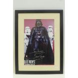 An autographed Star Wars photograph of Darth Vader signed by Dave Prowse with certificate of