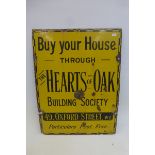 A "Buy Your House through The Hearts of Oak Building Society" rectangular enamel sign, 15 x 26".