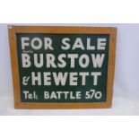 A Burstow & Hewett of Battle, East Sussex twin hardboard "For Sale" sign, set within a wooden frame,