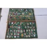 Two boards of WWI and WWII regimental military badges from around the world including Scotland,