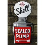 A reproduction Shell Sealed Pump enamel sign, 12 1/2 x 27 1/2".