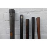 Four assorted snooker cues including a Wright & Co. and a cased E. J. Tiley Ltd makers Accrington.