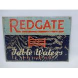 A Redgate Table Waters part pictorial tin advertising sign, new old stock, 16 x 11".