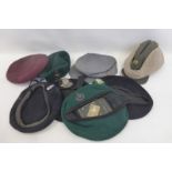 Six assorted military berets including the Royal Marines Parachute, the Edinburgh University