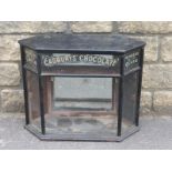 A Victorian Cadbury's chocolate "Makers to the Queen" three sided display cabinet with mirrored