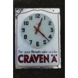 A Smith Sectric rectangular wall clock advertising Craven "a".