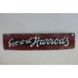 A "Get it at Harrods" rectangular enamel sign, 26 3/4 x 6".