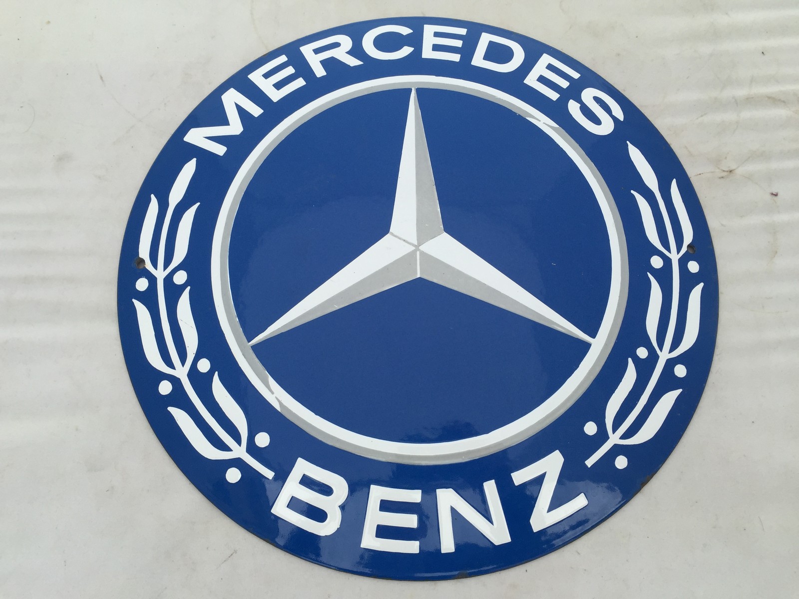 Mercedece Sign A Mercedes-Benz circular enamel sign, 15 3/4