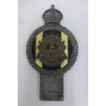 A Gaunt of London Bedfordshire and Hertfordshire regimental car badge.