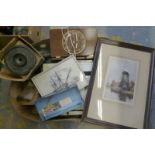 A box of mixed collectables including framed etchings, a folding book rack, large prisms etc.