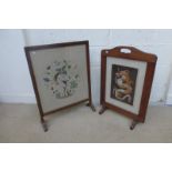 Two glazed needlework tapestry fire screens.