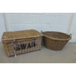 A wicker/cane laundry basket stamped Swan 32.70 and a cane twin handled washing basket.