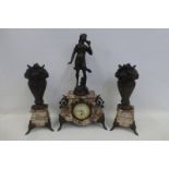 A French Art Nouveau clock garniture, the clock surmounted with a spelter figure of a young girl,