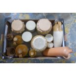 An assortment of stoneware jars, flagons, and two ginger beer bottles marked H. Merry and Maskell