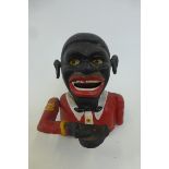 A native African cast metal novelty money box.