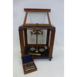 A mahogany cased Paul Bunge Hamburg Analytical Balance circa 1920 with a brass plaque M.A.P. Z