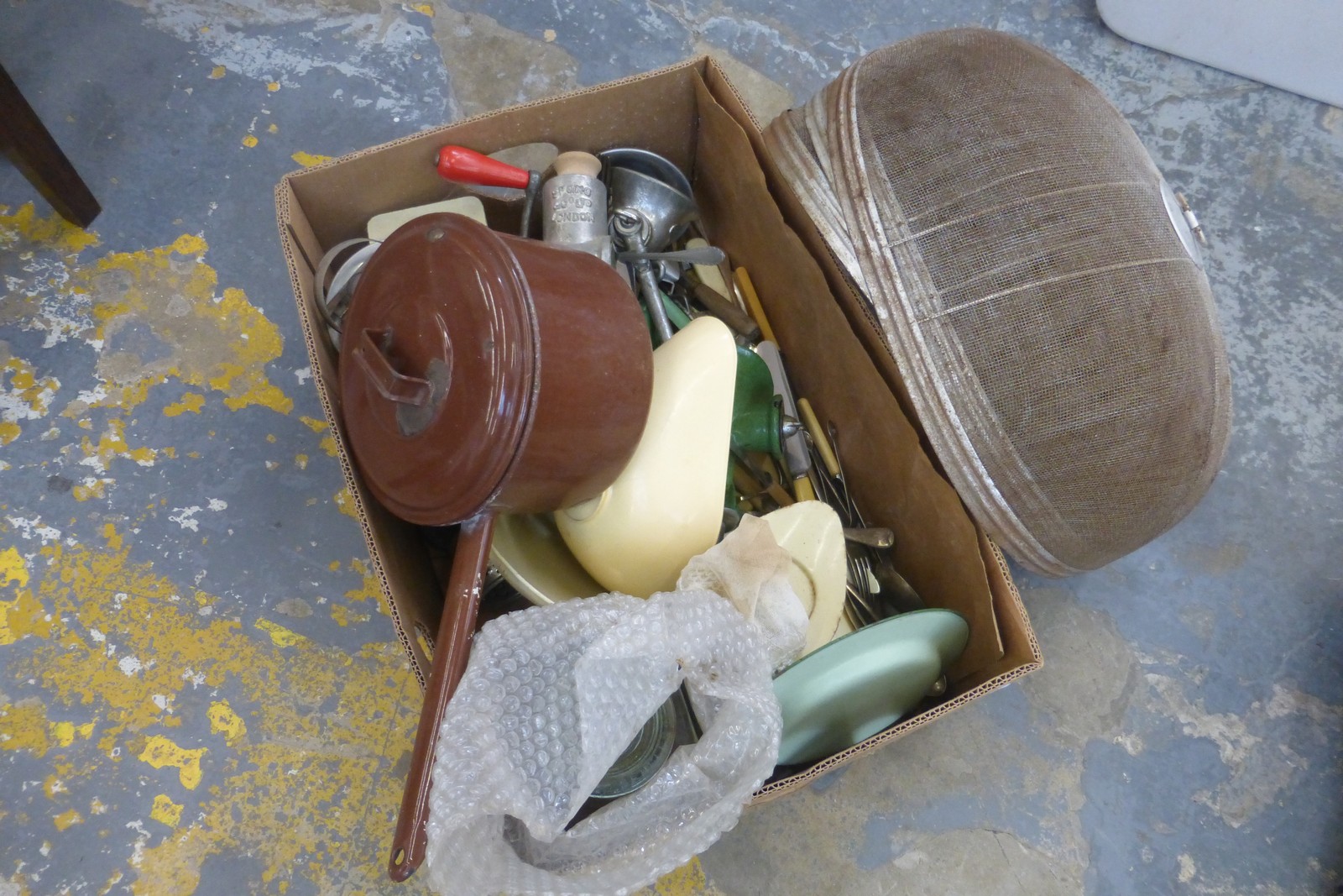 A box of assorted kitchenalia of various ages including wire work food covers.