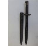 A Spanish model 1943 knife bayonet in its steel scabbard.