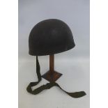 An undated WW2 style British Paratrooper's or Despatch Rider's helmet with liner and chin strap.