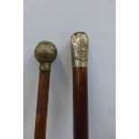 A Royal Marines walking cane and a Dorsetshire Regiment walking cane, both A/F.