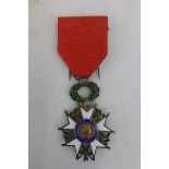 A French Legion d'Honneur medal.