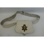 A Royal Netherlands Air Force white leather pouch and strap.