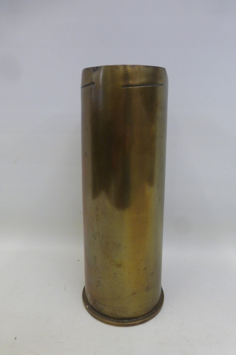 A heavy 1978 brass shell case.