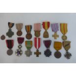 An assortment of fifteen European military medals mainly from France and Belgium.