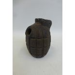 An inert Mills grenade.