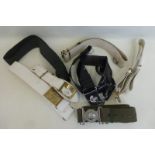 Seven British Army belts, some with regimental buckles including: Royal Welch Fusiliers, Light