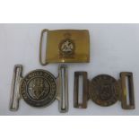 Three military belt buckles.